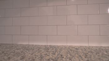 Subway tile backsplash in kitchen